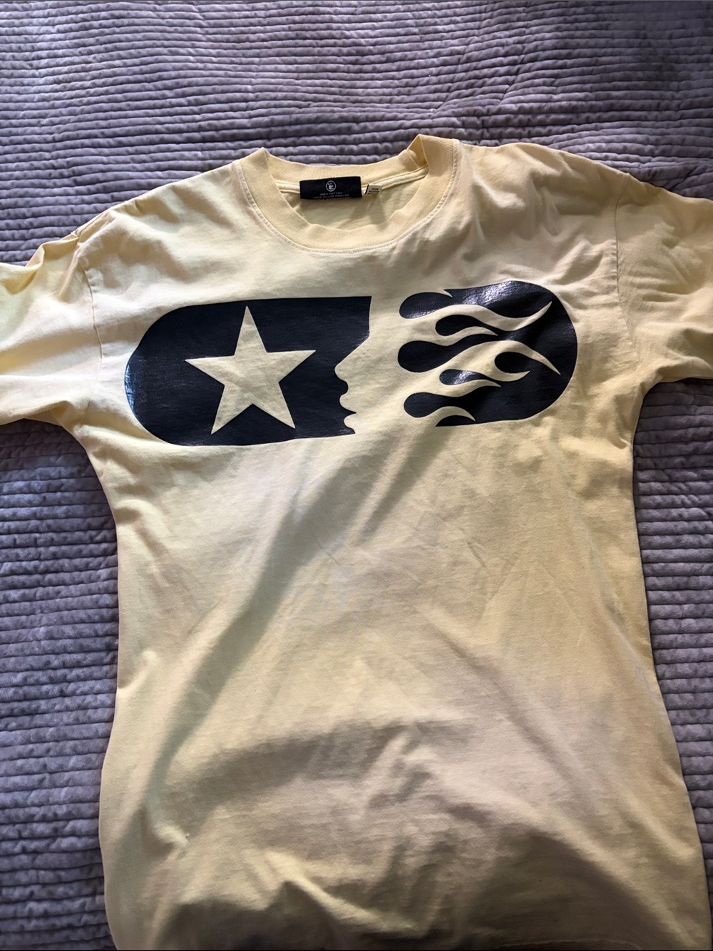 Yellow Graphic Tee with Black Star & Flame Design